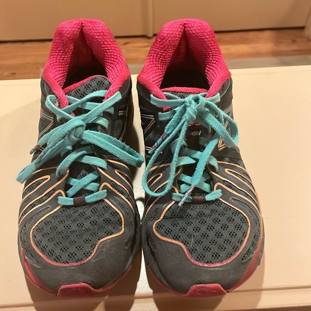 Used New Balance sneakers, size 5.5. Hot pink and teal.